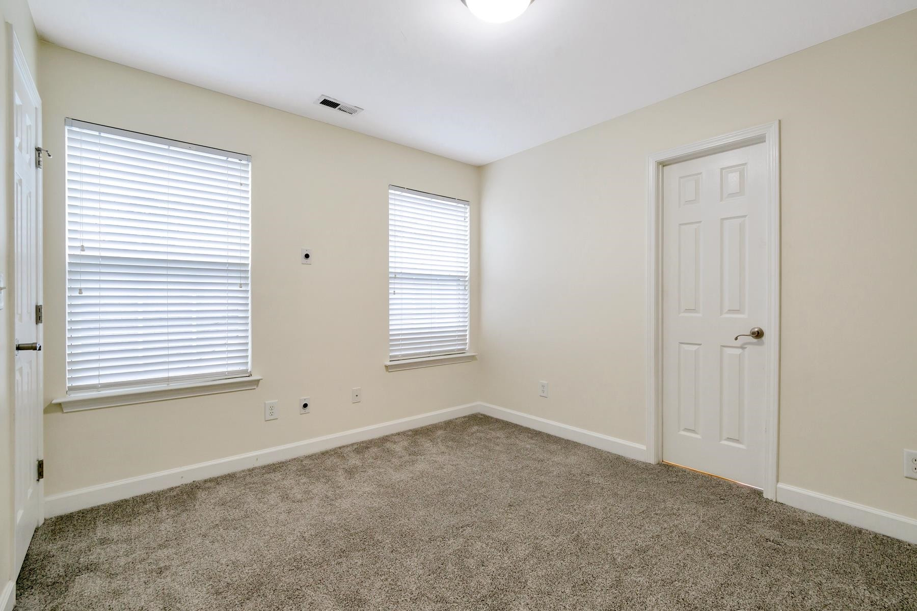 6316 Sparkling Brook Drive Raleigh, NC 27616 - Photo 29 of 44 a view of an empty room with a window