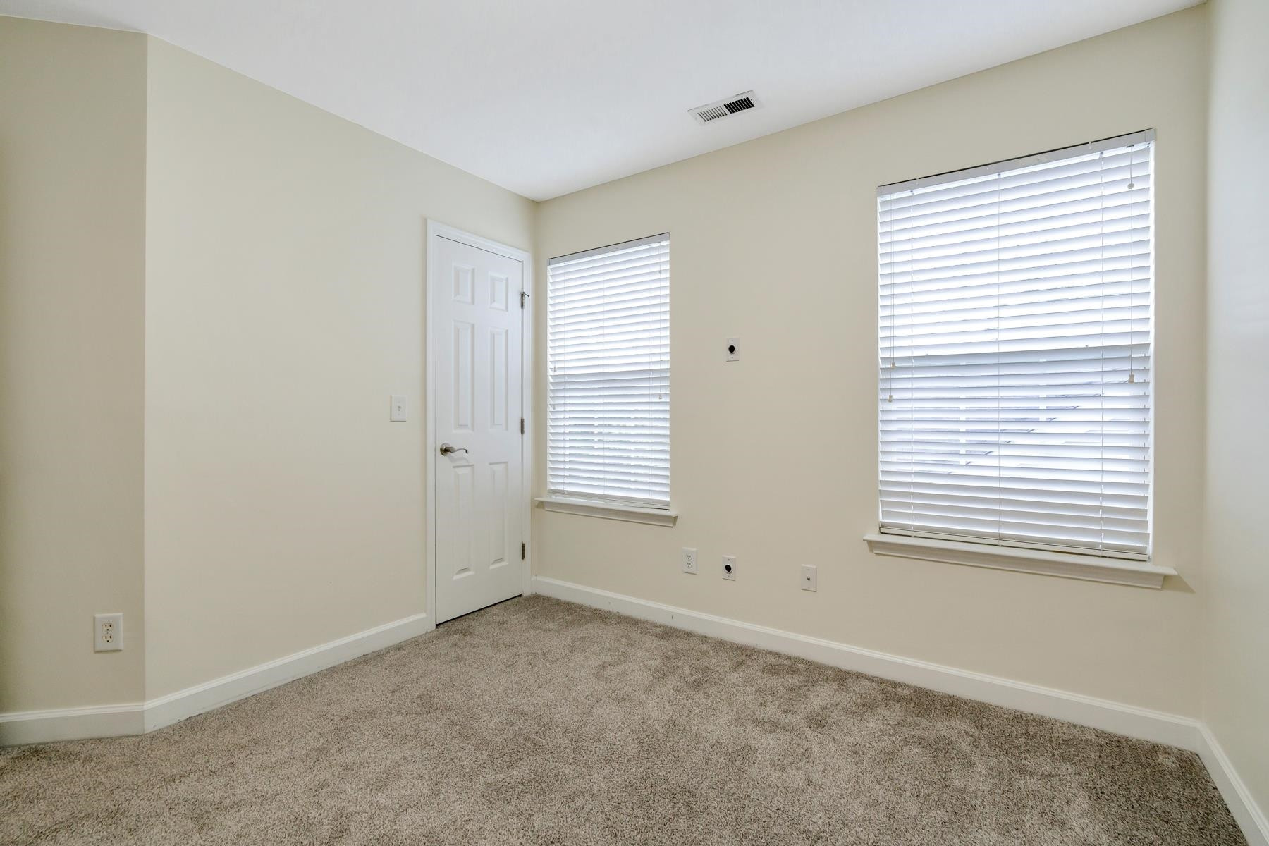 6316 Sparkling Brook Drive Raleigh, NC 27616 - Photo 30 of 44 a view of an empty room with a window