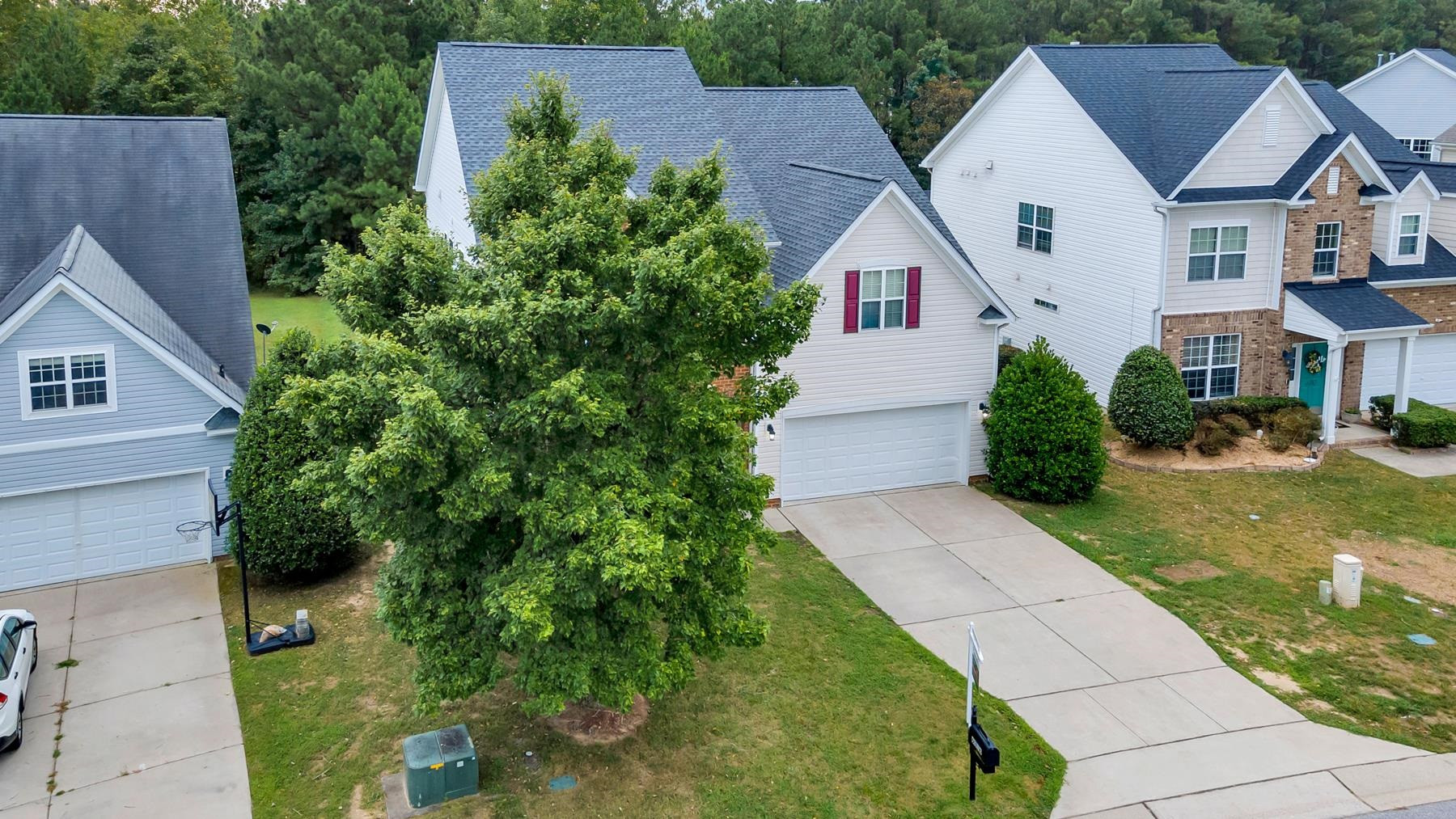 6316 Sparkling Brook Drive Raleigh, NC 27616 - Photo 3 of 44 a view of house with garden