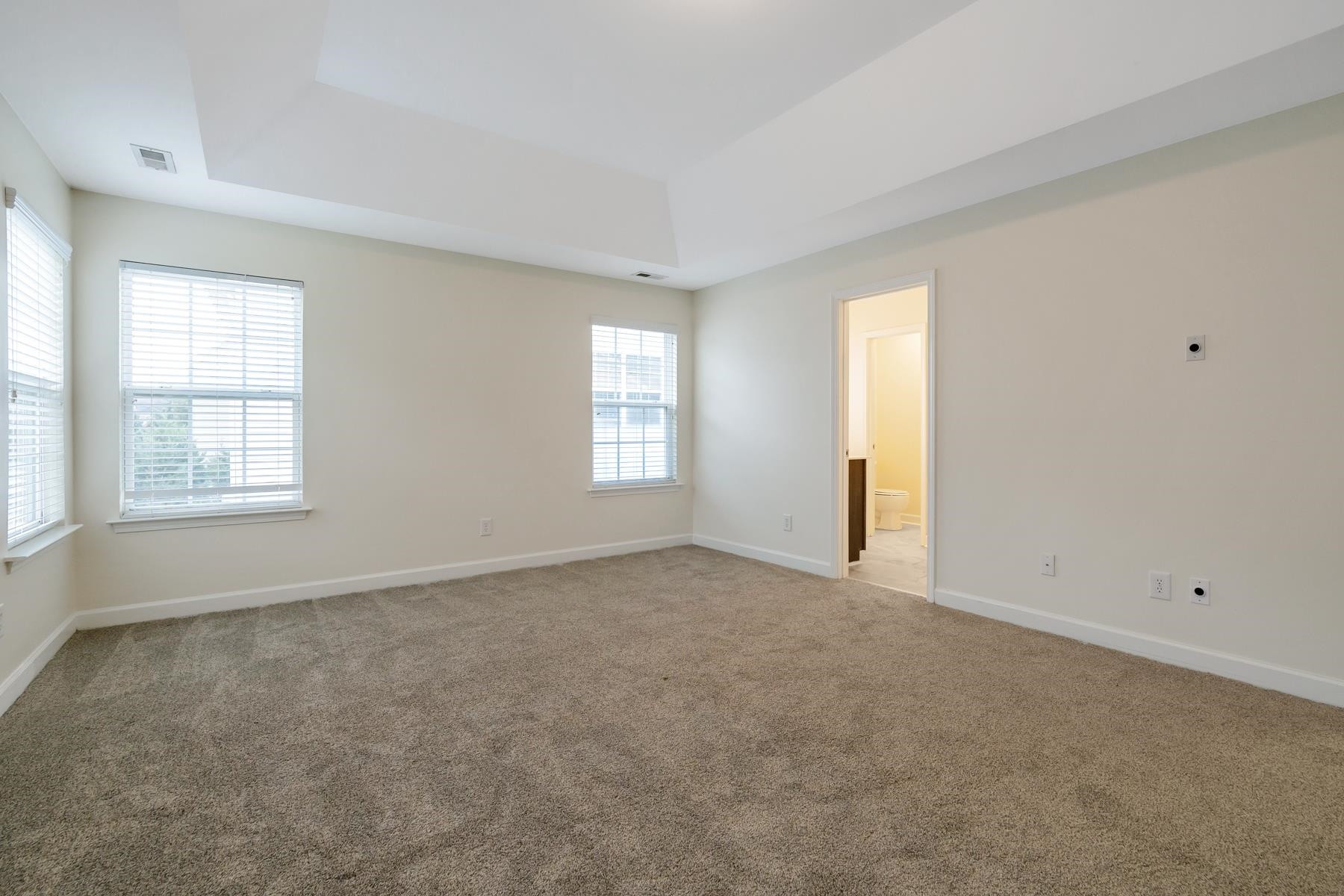 6316 Sparkling Brook Drive Raleigh, NC 27616 - Photo 32 of 44 a view of an empty room with a window