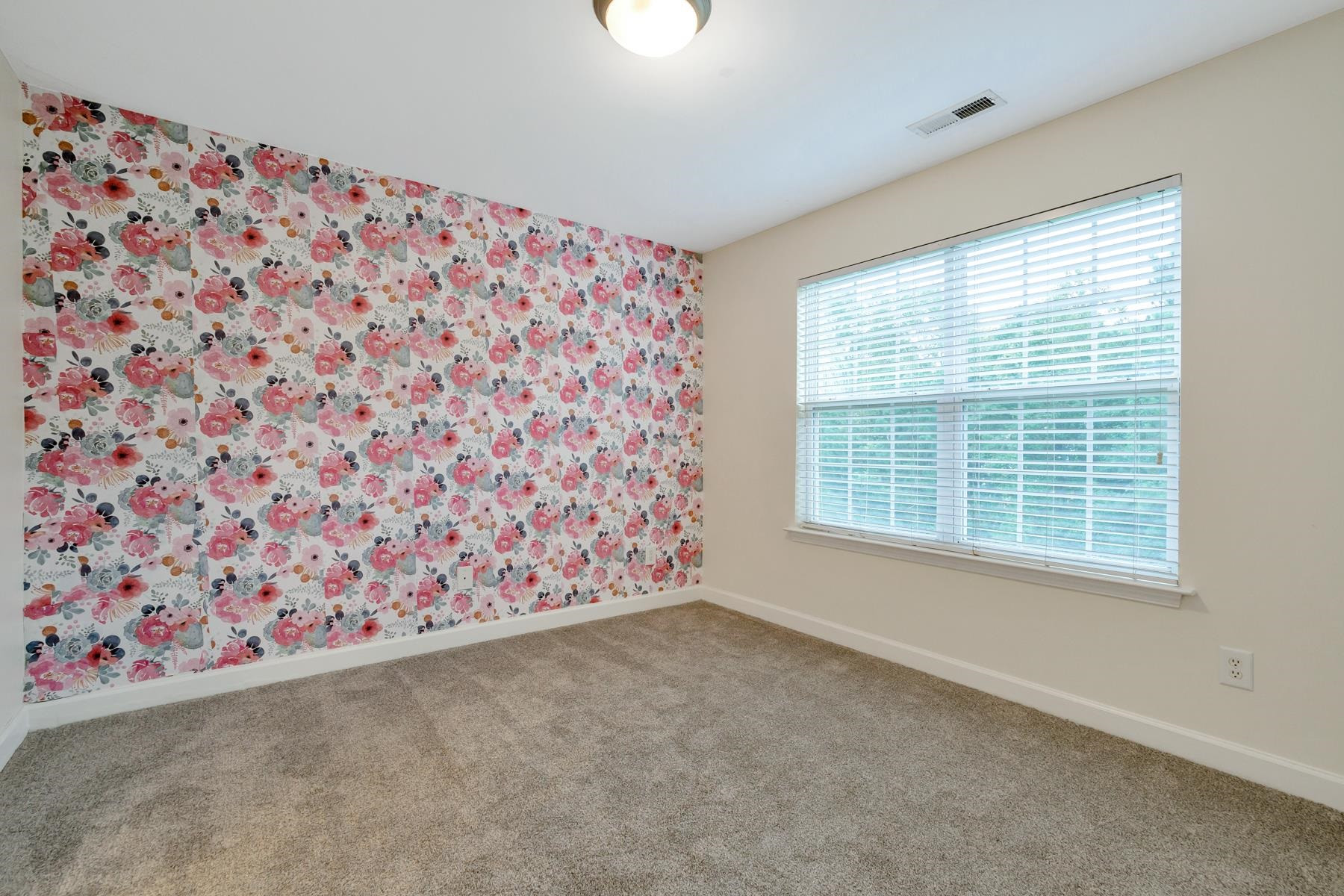6316 Sparkling Brook Drive Raleigh, NC 27616 - Photo 38 of 44 a view of an empty room and window