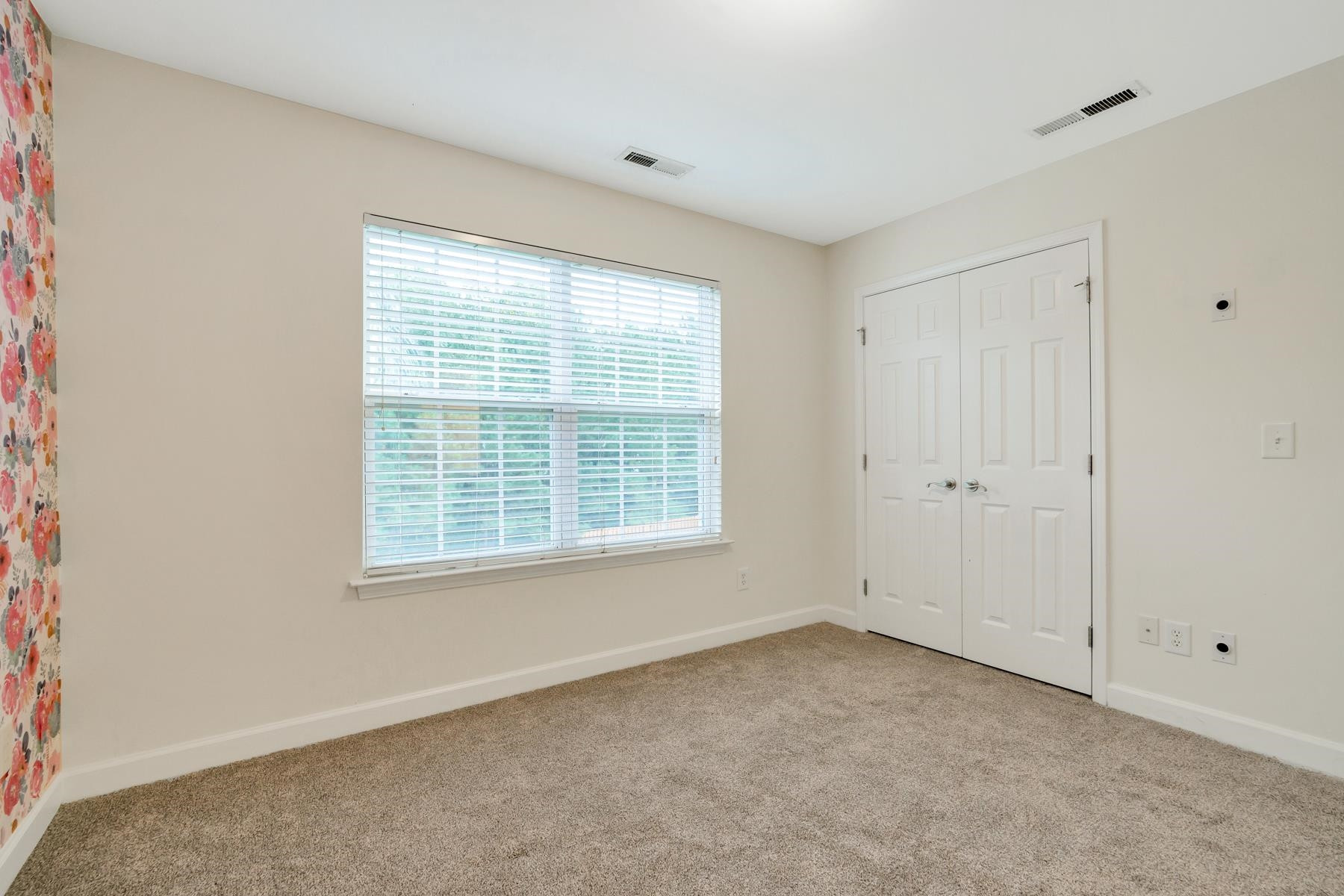 6316 Sparkling Brook Drive Raleigh, NC 27616 - Photo 39 of 44 a view of an empty room with a window