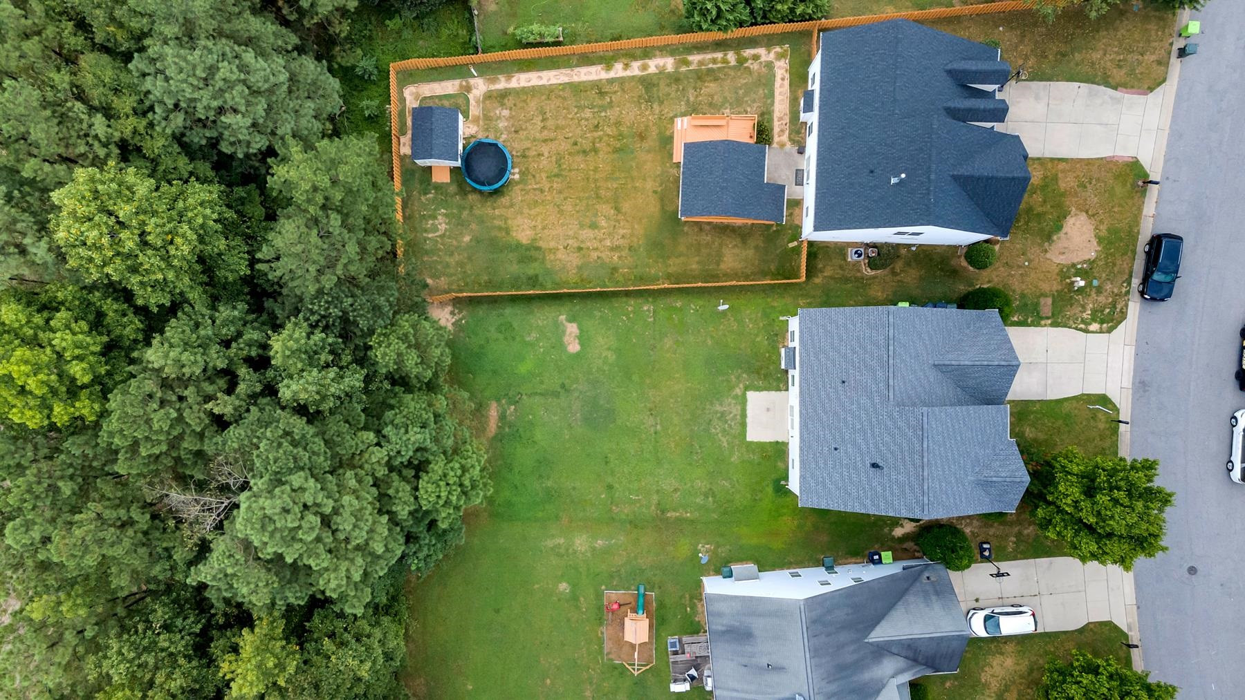 6316 Sparkling Brook Drive Raleigh, NC 27616 - Photo 7 of 44 an aerial view of residential house with outdoor space and swimming pool