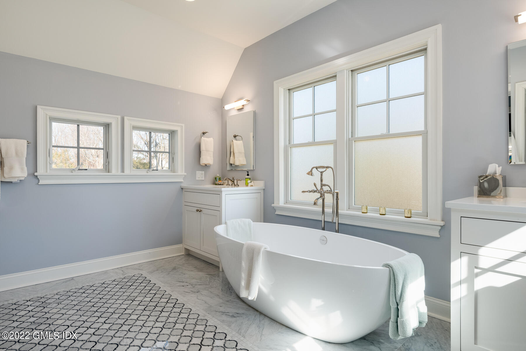 22 Widgeon Way Greenwich, CT 06830 - Photo 13 of 26 a bathroom with a bathtub sink and window