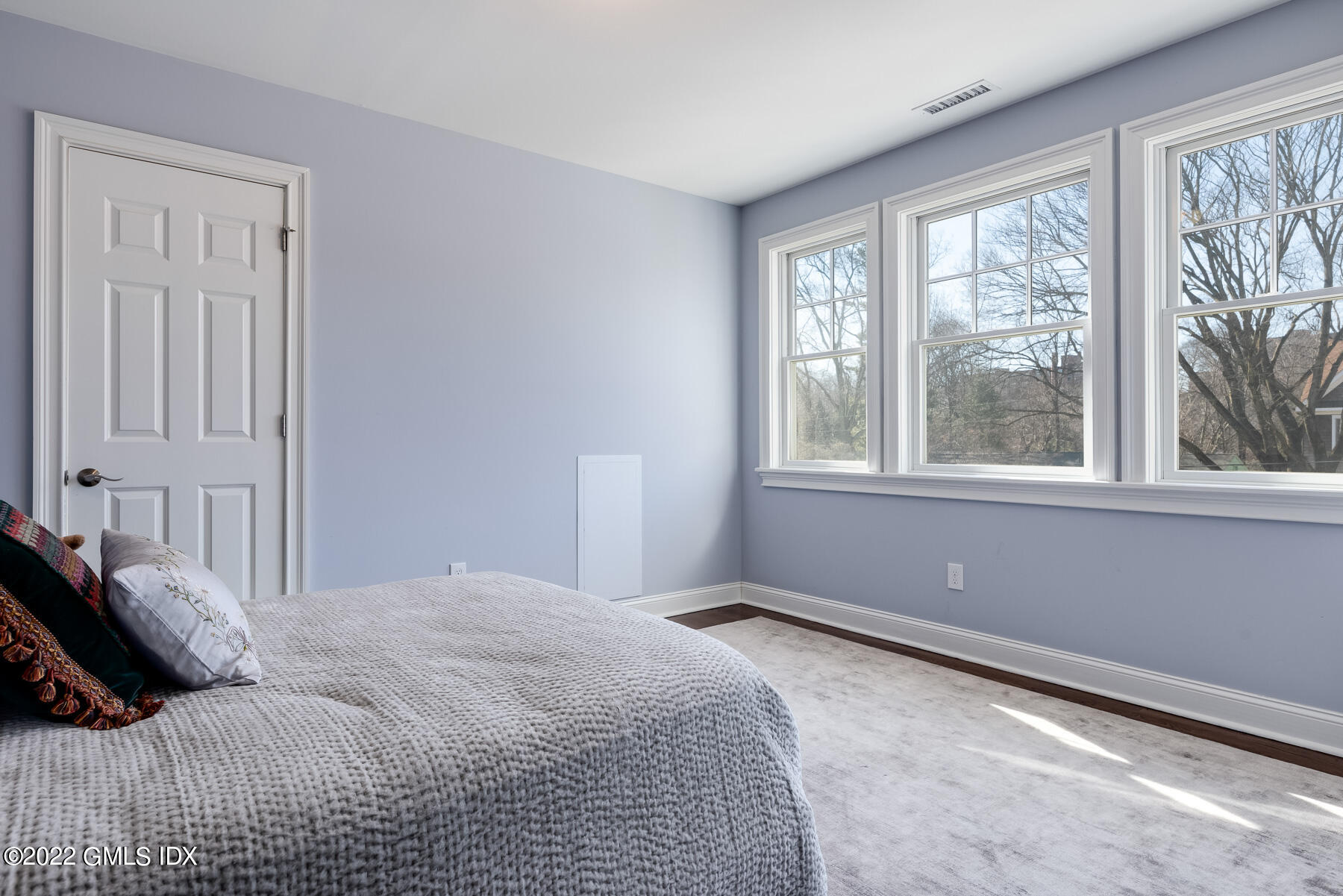 22 Widgeon Way Greenwich, CT 06830 - Photo 15 of 26 a bedroom with a bed and a window