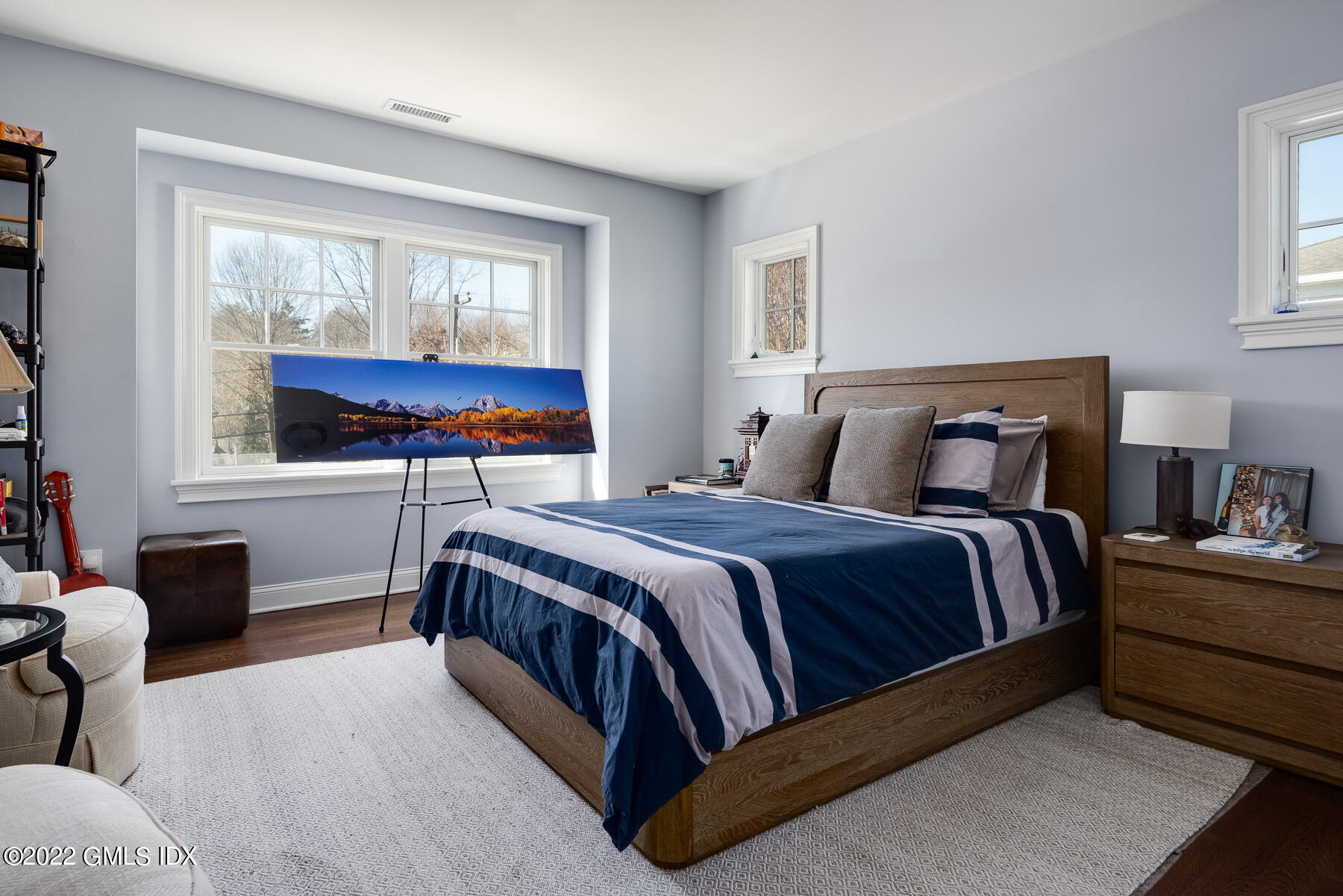 22 Widgeon Way Greenwich, CT 06830 - Photo 16 of 26 a bedroom with a large bed and a window