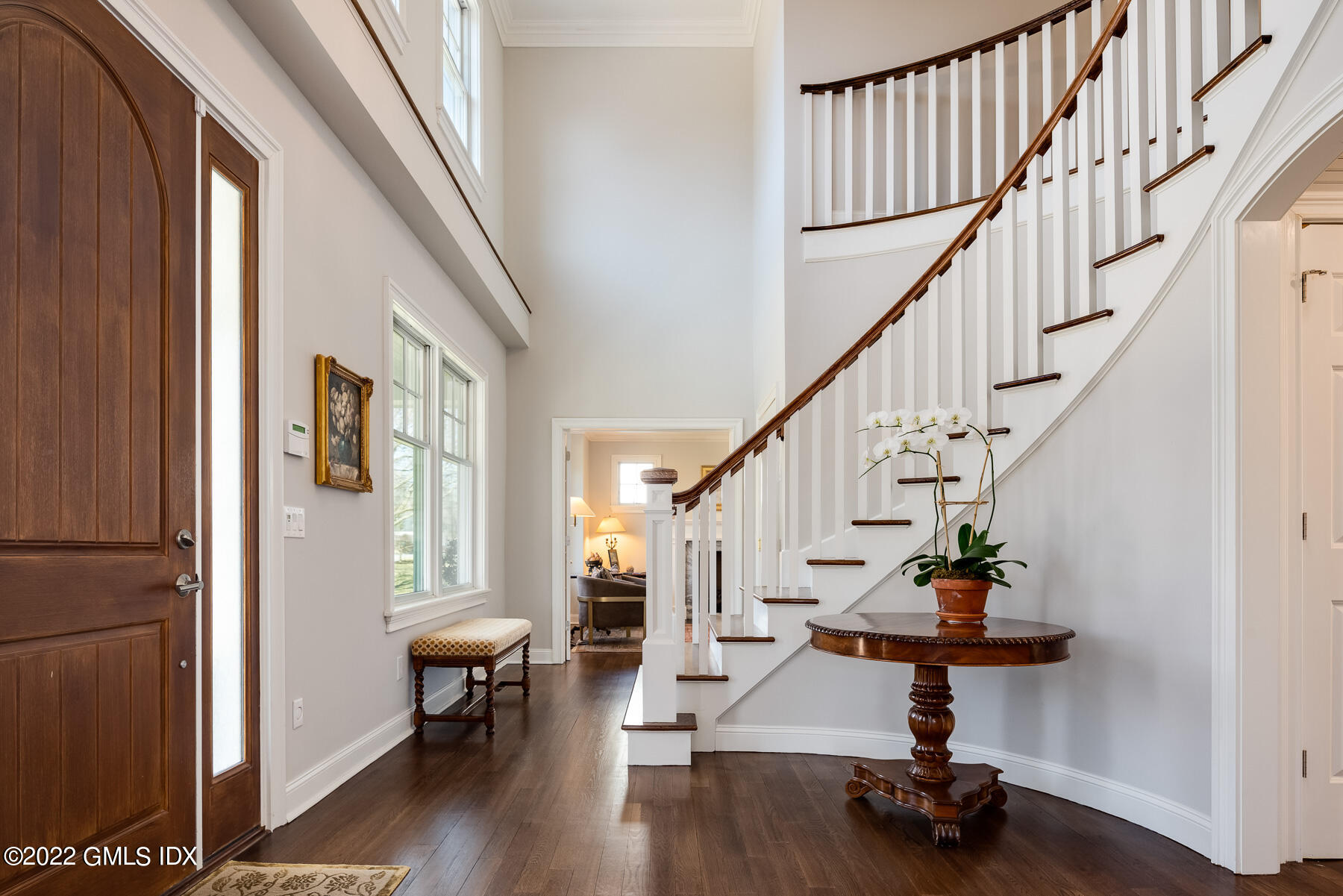 22 Widgeon Way Greenwich, CT 06830 - Photo 2 of 26 a view of entryway with wooden floor and stairs