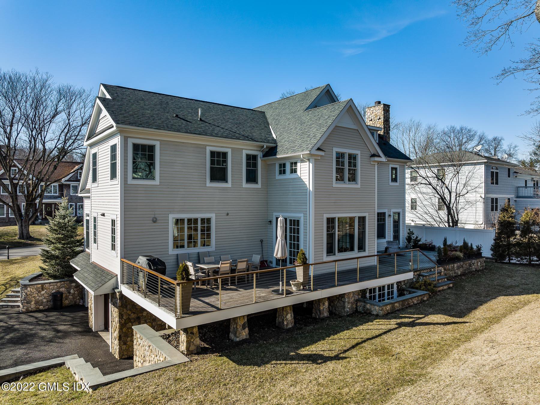 22 Widgeon Way Greenwich, CT 06830 - Photo 21 of 26 a house view with a outdoor seating