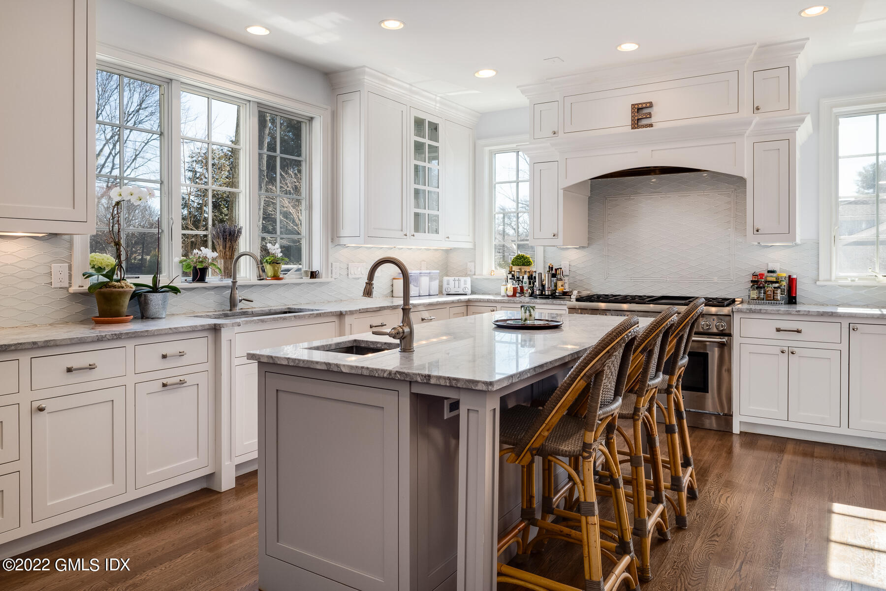 22 Widgeon Way Greenwich, CT 06830 - Photo 5 of 26 a kitchen with a sink a window and cabinets