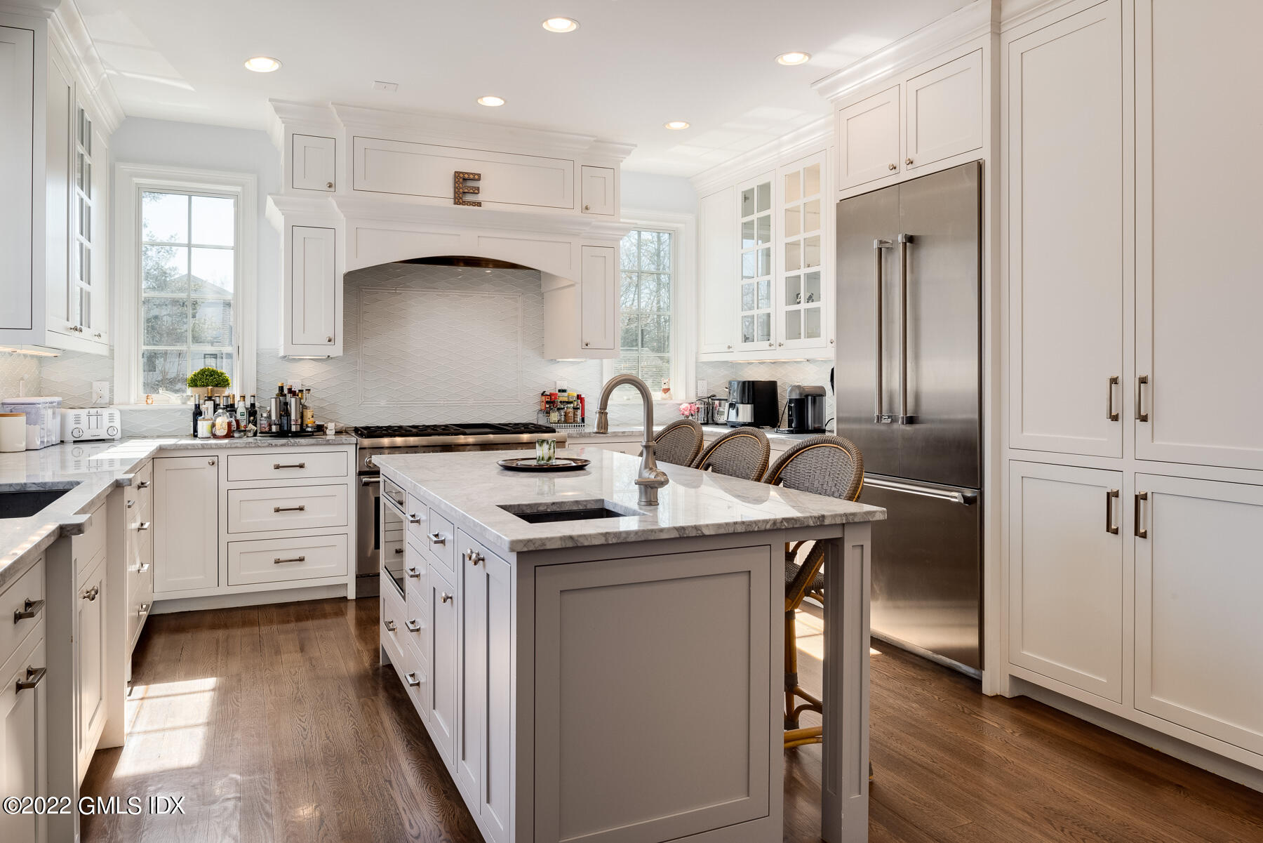 22 Widgeon Way Greenwich, CT 06830 - Photo 6 of 26 a kitchen with a sink stove and refrigerator