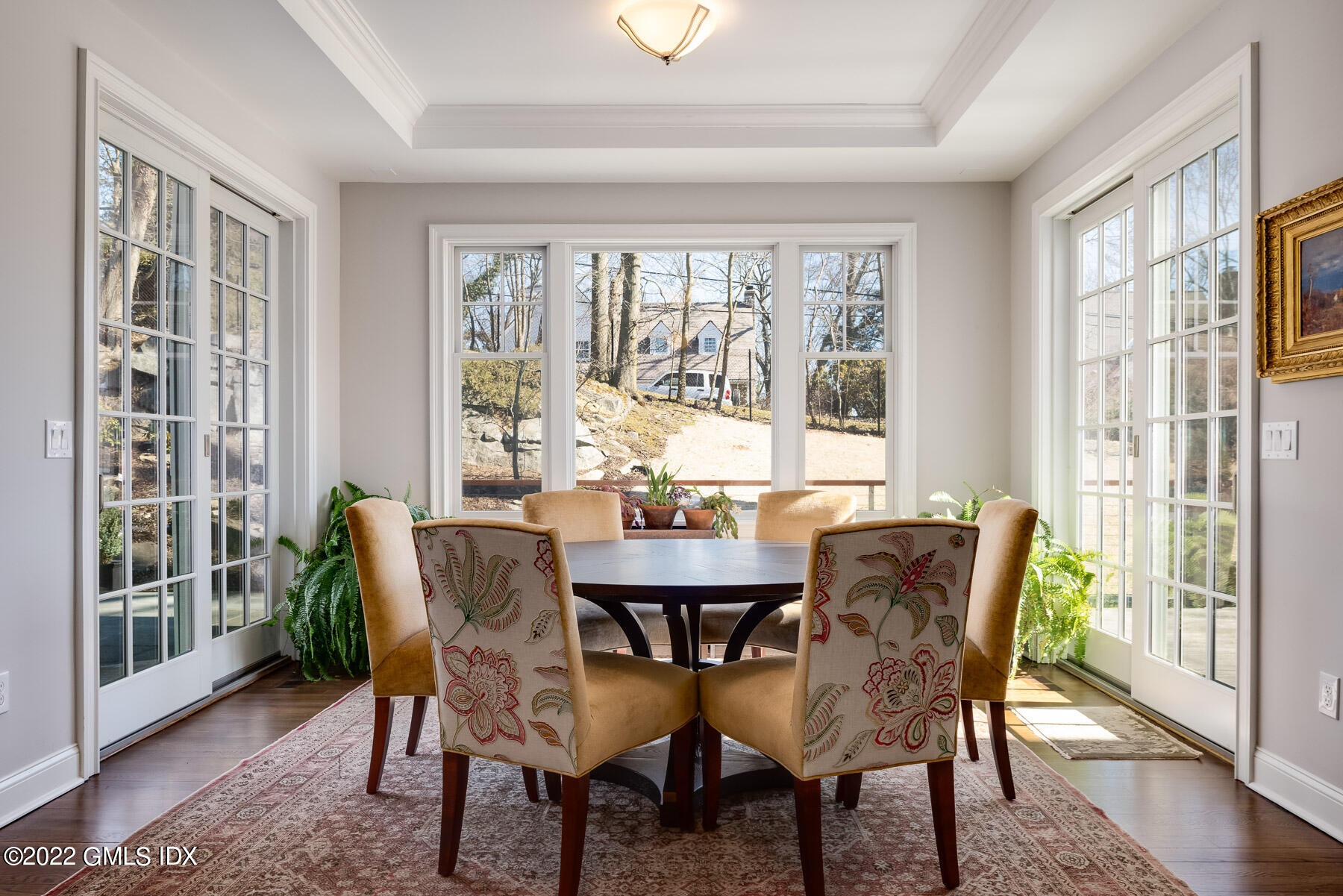 22 Widgeon Way Greenwich, CT 06830 - Photo 8 of 26 a view of a dining room with furniture window and wooden floor