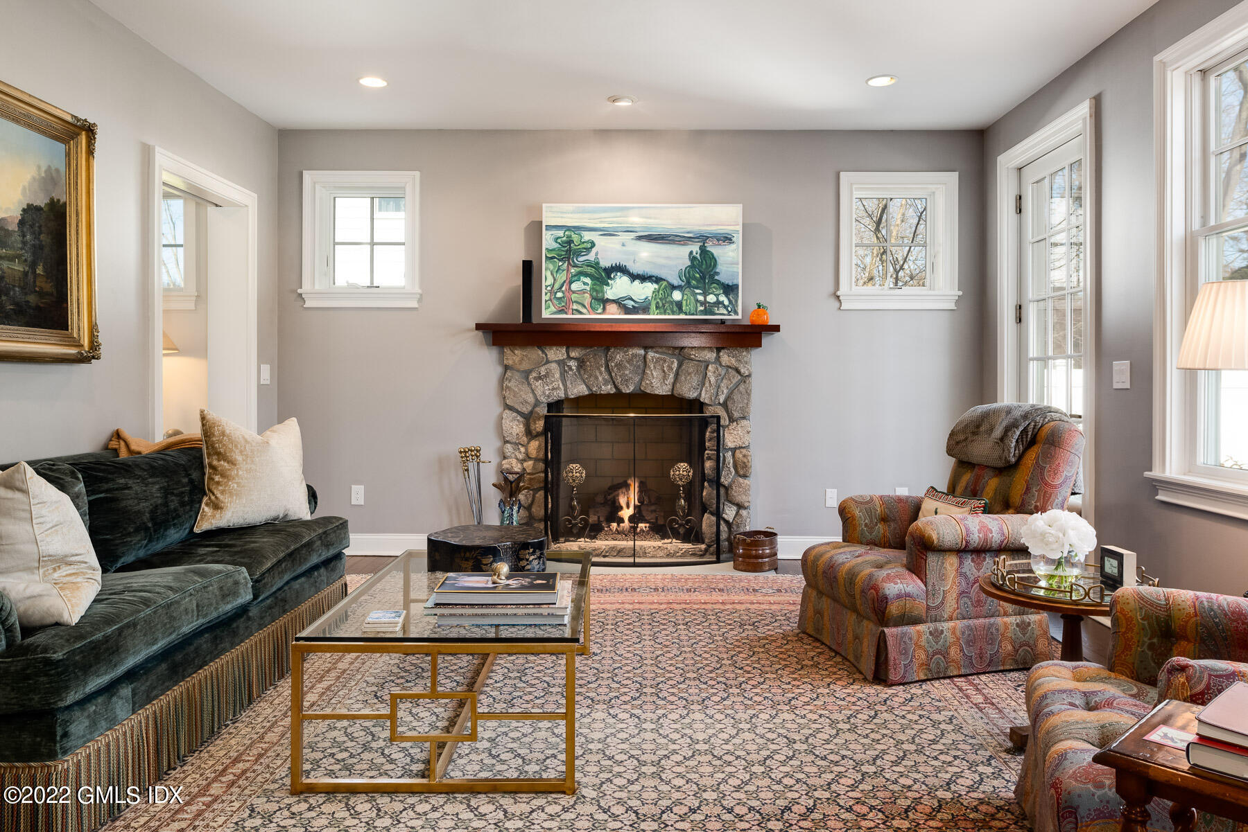 22 Widgeon Way Greenwich, CT 06830 - Photo 10 of 26 a living room with furniture and a fireplace