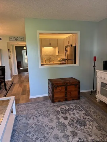 a room with furniture and a window