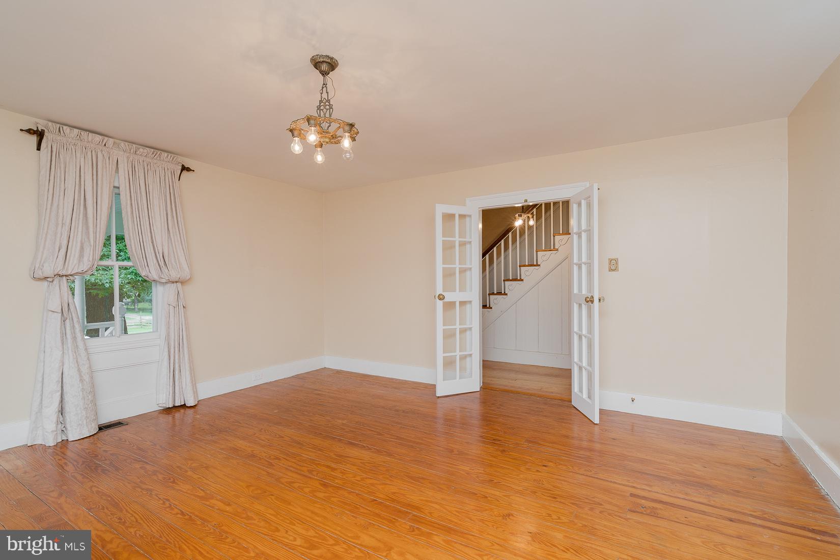 242 Shelton Shop Road Stafford, VA 22554 - Photo 19 of 53 Formal living room with original hardwood flooring