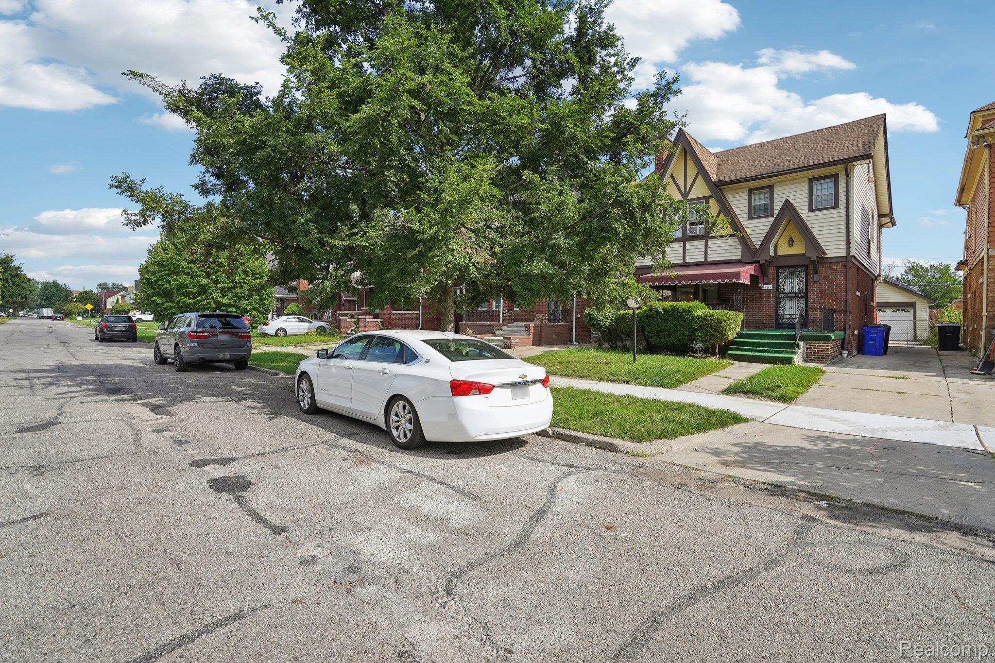 4101 Pasadena Street Detroit, MI 48238 - Photo 6 of 42 Tudor Revival exterior featuring half-timbering, brick lower level, and a gabled roof