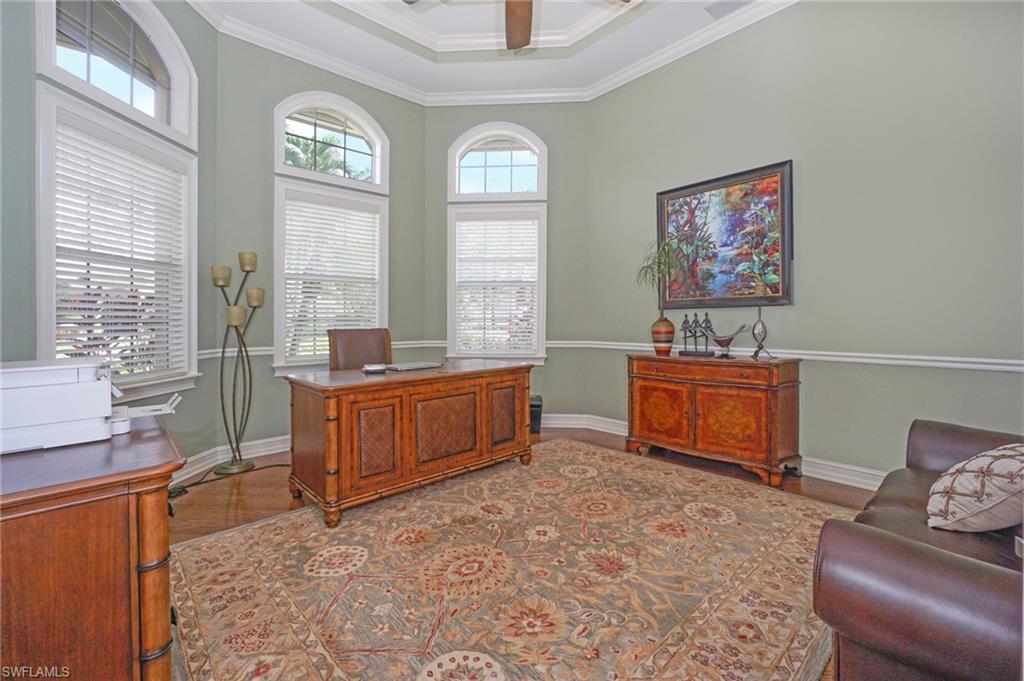 8007 Tiger Lily Drive Naples, FL 34113 - Photo 6 of 32 a living room with furniture and a window