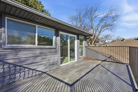 a balcony view with a outdoor seating