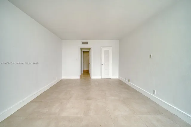 an empty room with a natural light