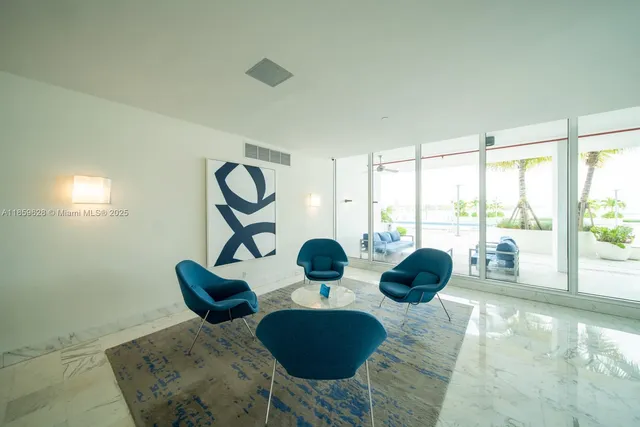 a room with furniture and a window