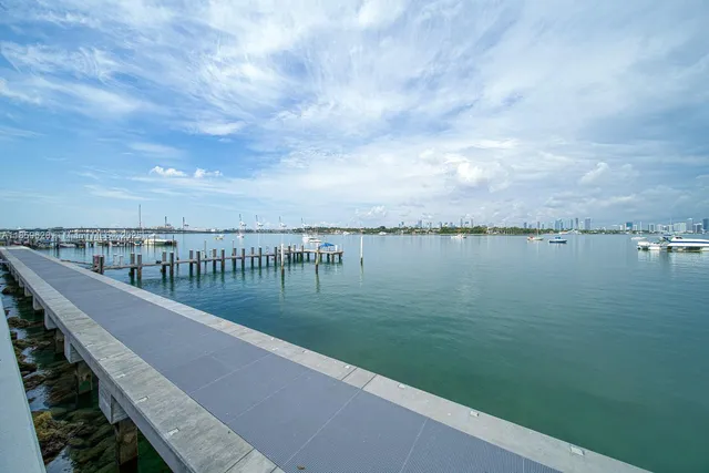 a view of a lake with a city from a terrace
