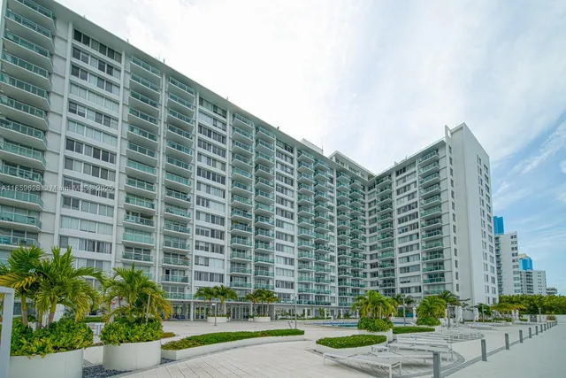 a view of a tall building in the background