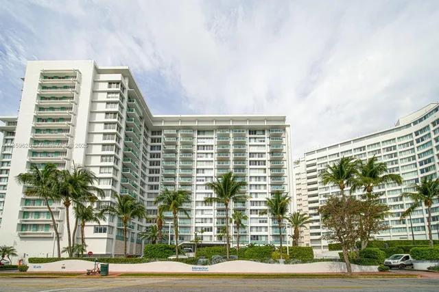 a view of a tall building from a street