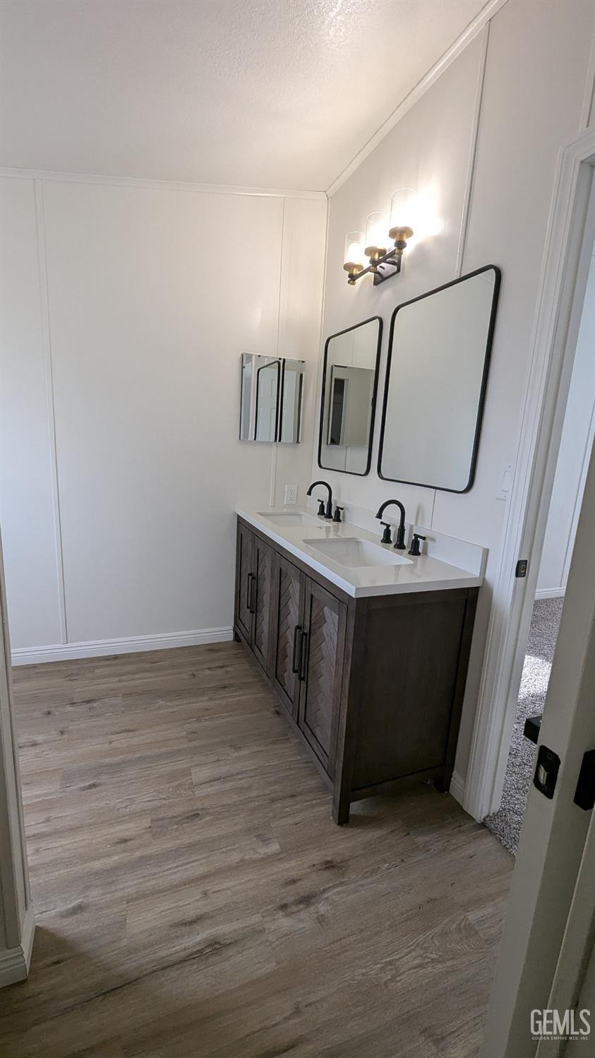 Undisclosed Address Wasco, CA 93280 - Photo 11 of 14 a view of a room with wooden floor and staircase