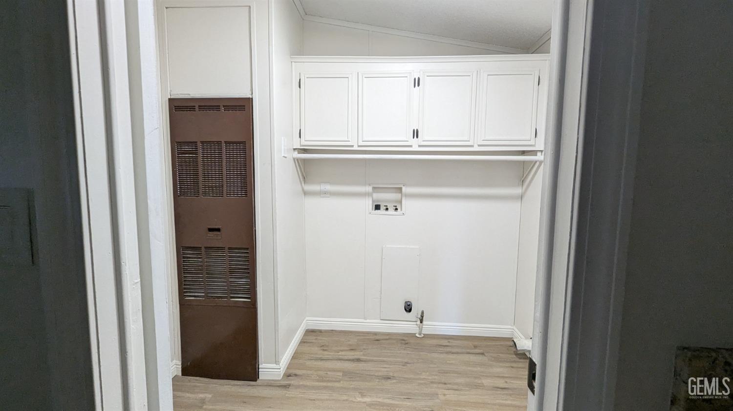 Undisclosed Address Wasco, CA 93280 - Photo 14 of 14 a view of cabinets and wooden floor