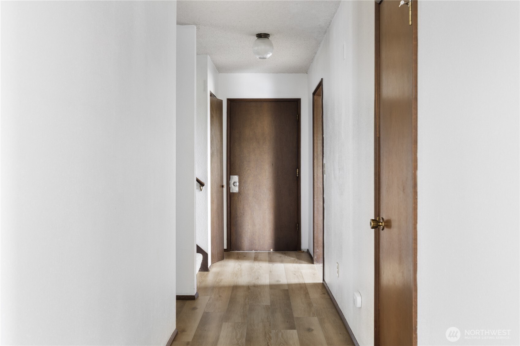 2725 Hunt Road Oak Harbor, WA 98277 - Photo 12 of 40 a view of a hallway with wooden floor