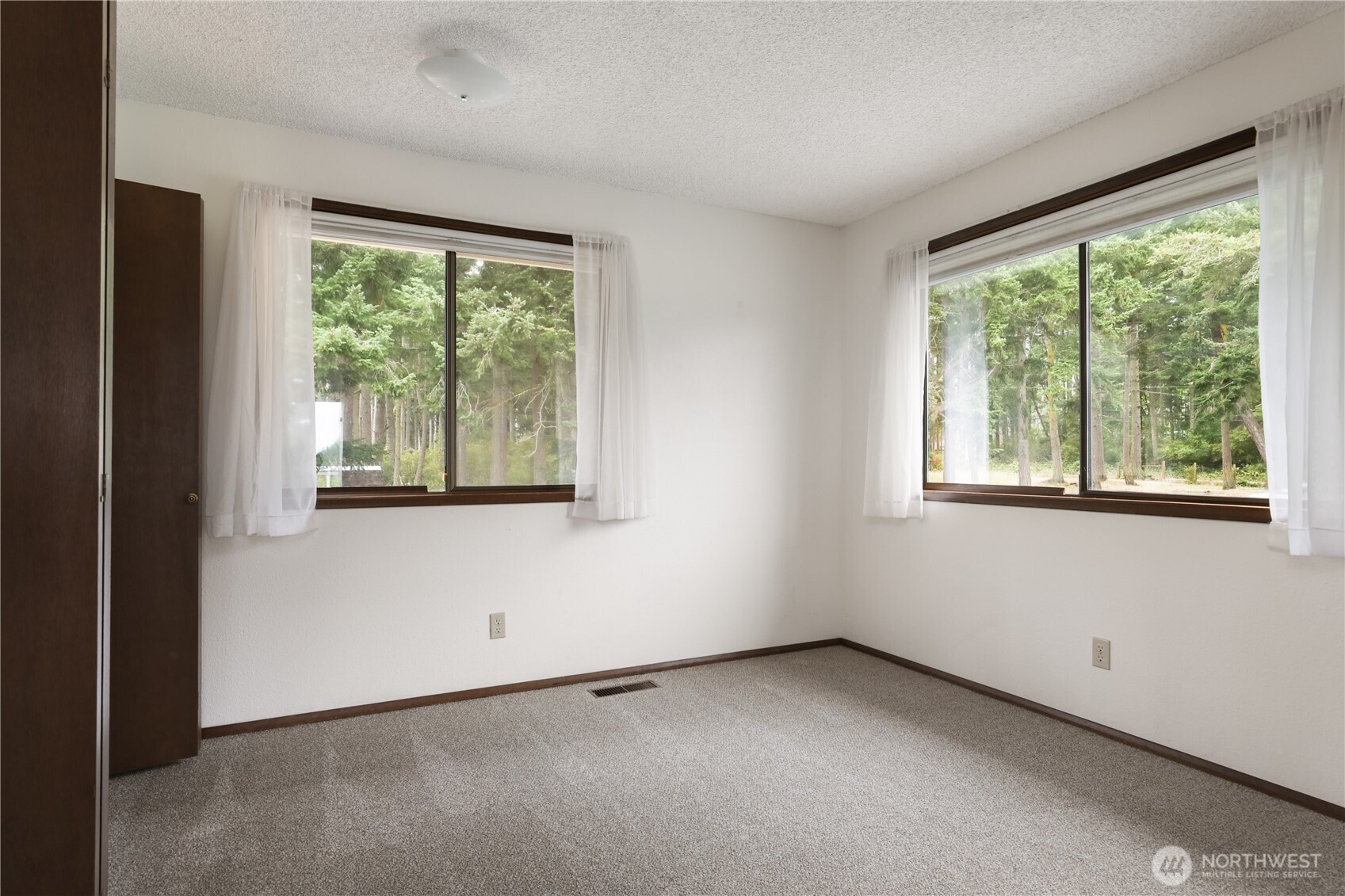2725 Hunt Road Oak Harbor, WA 98277 - Photo 27 of 40 a view of an empty room with a window