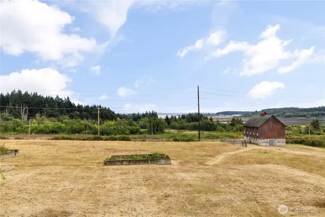 a view of a lake with a big yard