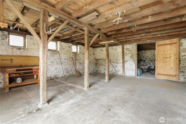a view of a room with wooden walls