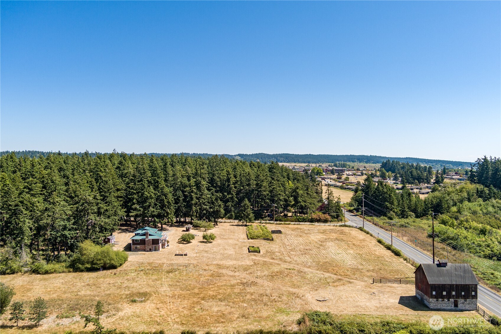 2725 Hunt Road Oak Harbor, WA 98277 - Photo 37 of 40 a view of a swimming pool with an outdoor seating