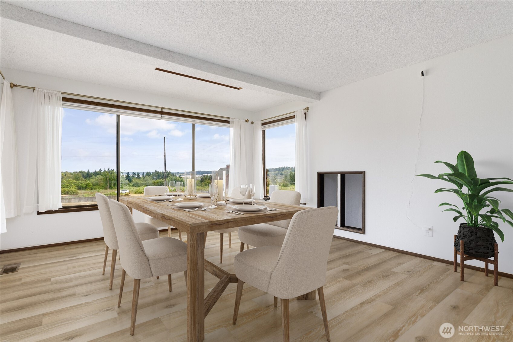 2725 Hunt Road Oak Harbor, WA 98277 - Photo 5 of 40 a view of a dining room with furniture window and wooden floor