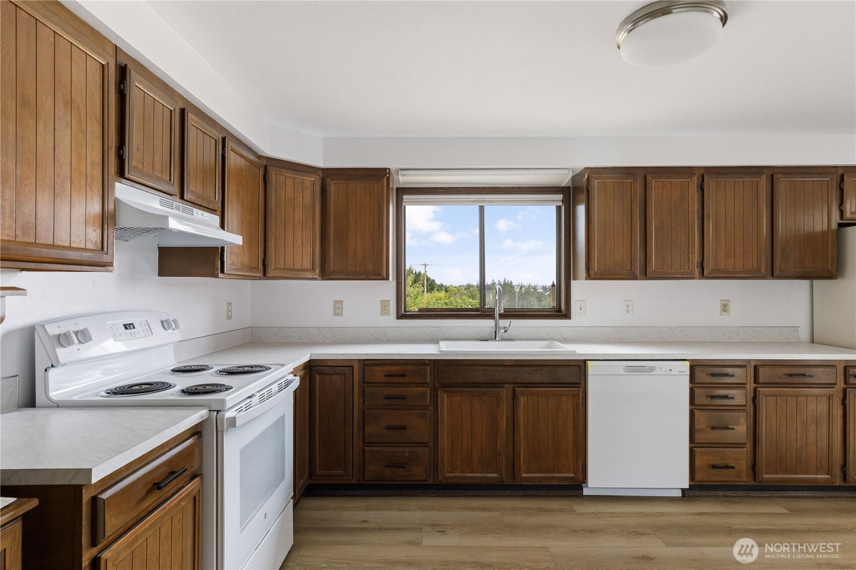2725 Hunt Road Oak Harbor, WA 98277 - Photo 8 of 40 a kitchen with a sink and cabinets