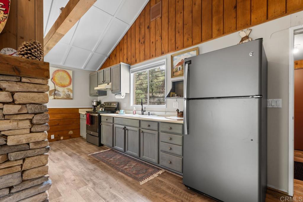 9150- Pine Creek Road, Unit 8 Pine Valley, CA 91962 - Photo 13 of 23 a kitchen with sink cabinets and refrigerator