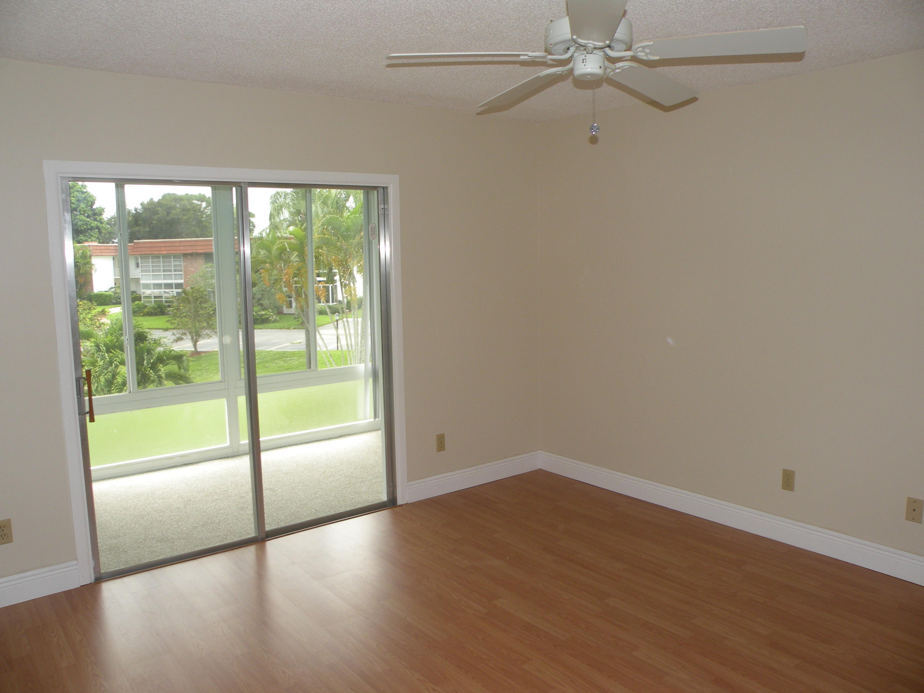 1225 Northwest 21st Street, Unit 211 Stuart, FL 34994 - Photo 5 of 14 MASTER BEDROOM