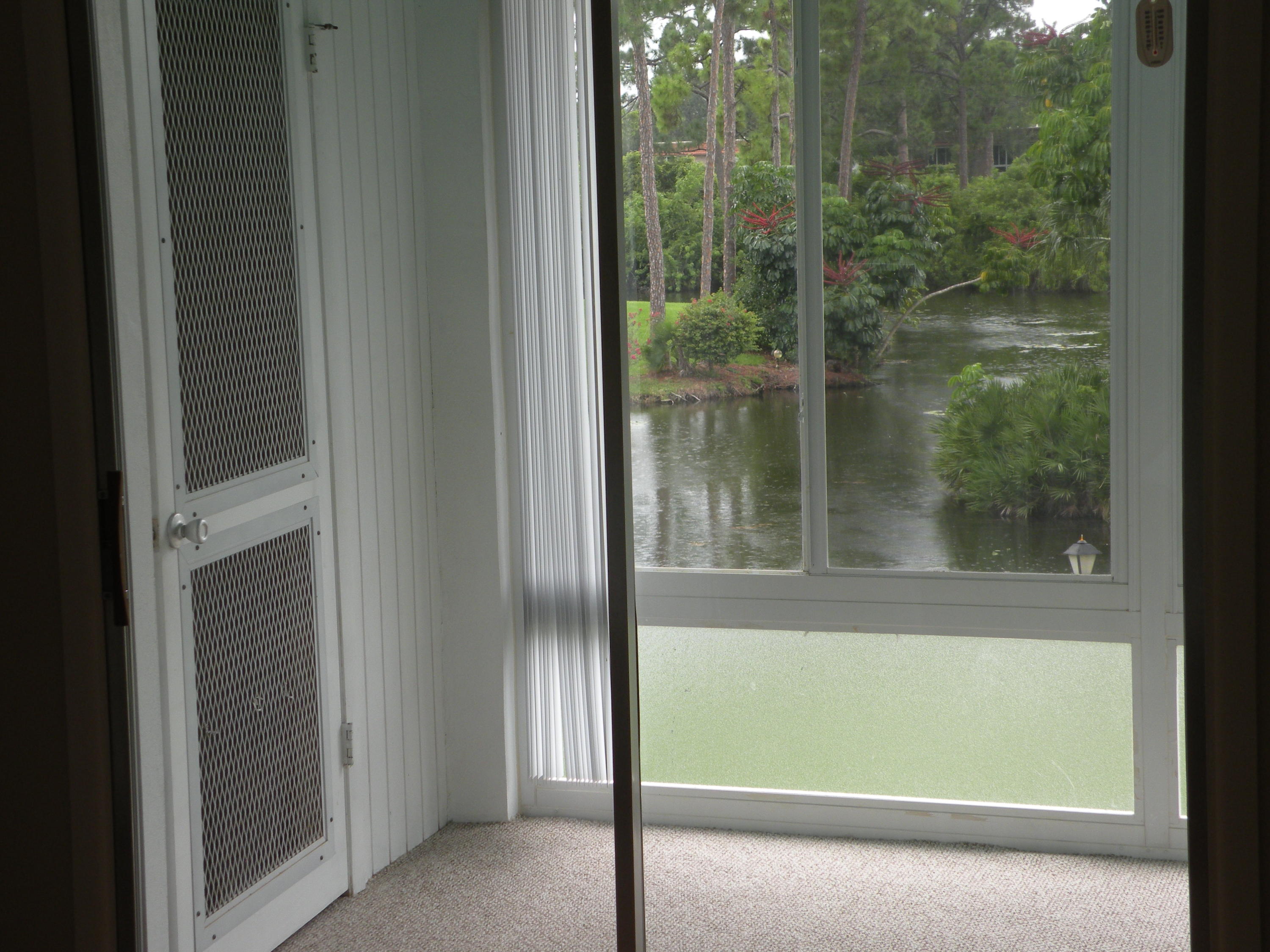 1225 Northwest 21st Street, Unit 211 Stuart, FL 34994 - Photo 7 of 14 UTILITY ROOM