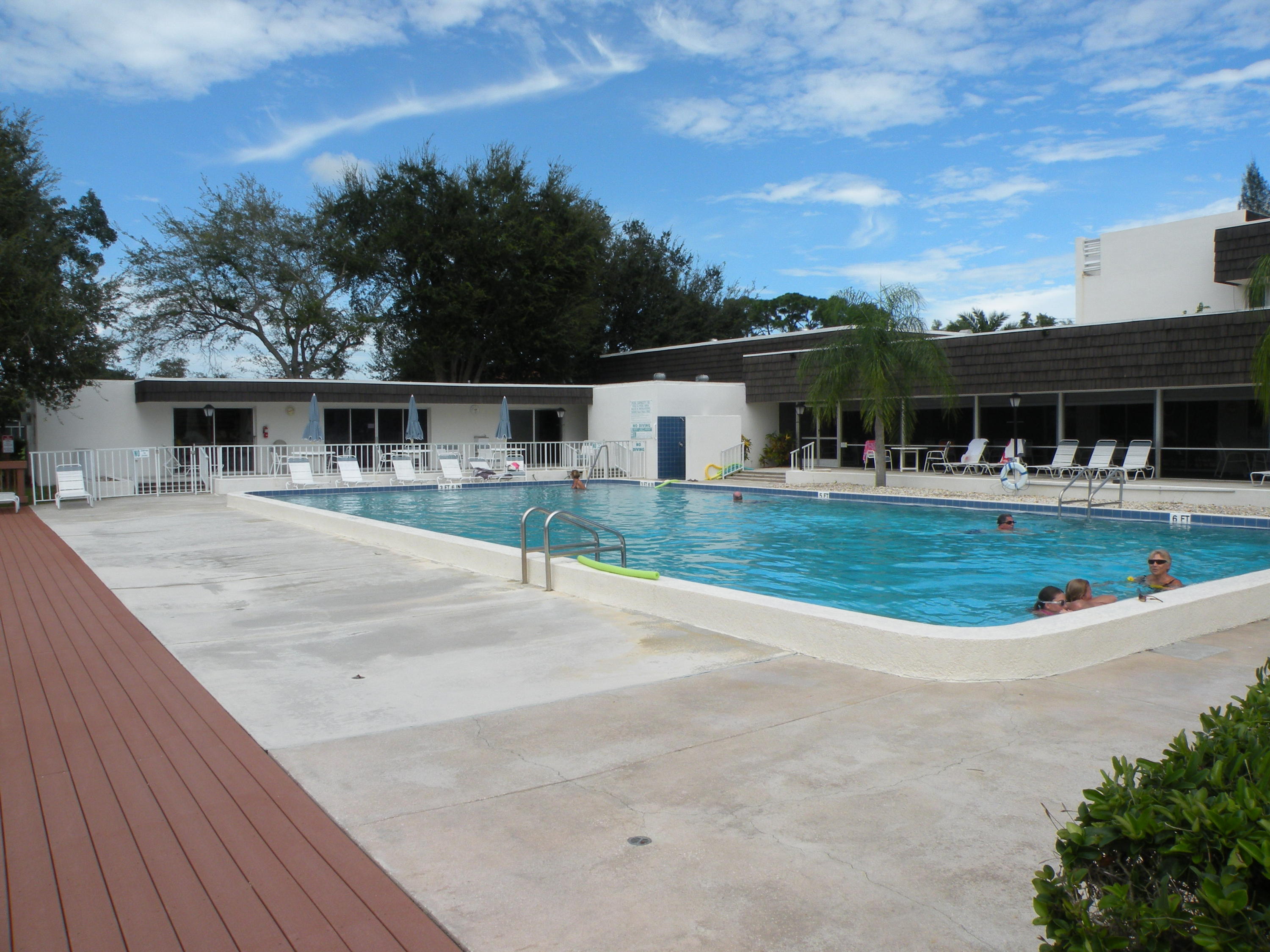 1225 Northwest 21st Street, Unit 211 Stuart, FL 34994 - Photo 9 of 14 LARGE NEATED POOL