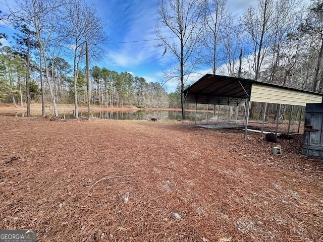 1800 Rock Springs Road Dublin, GA 31021 - Photo 4 of 9 a view of a house with a yard and tree s