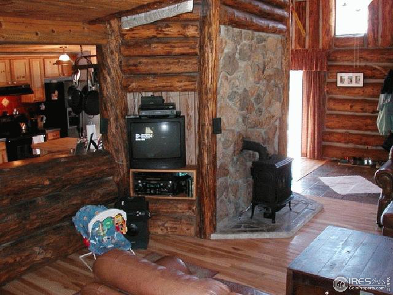 32027 Sylvan Road Golden, CO 80403 - Photo 5 of 12 Living rm to kitchen