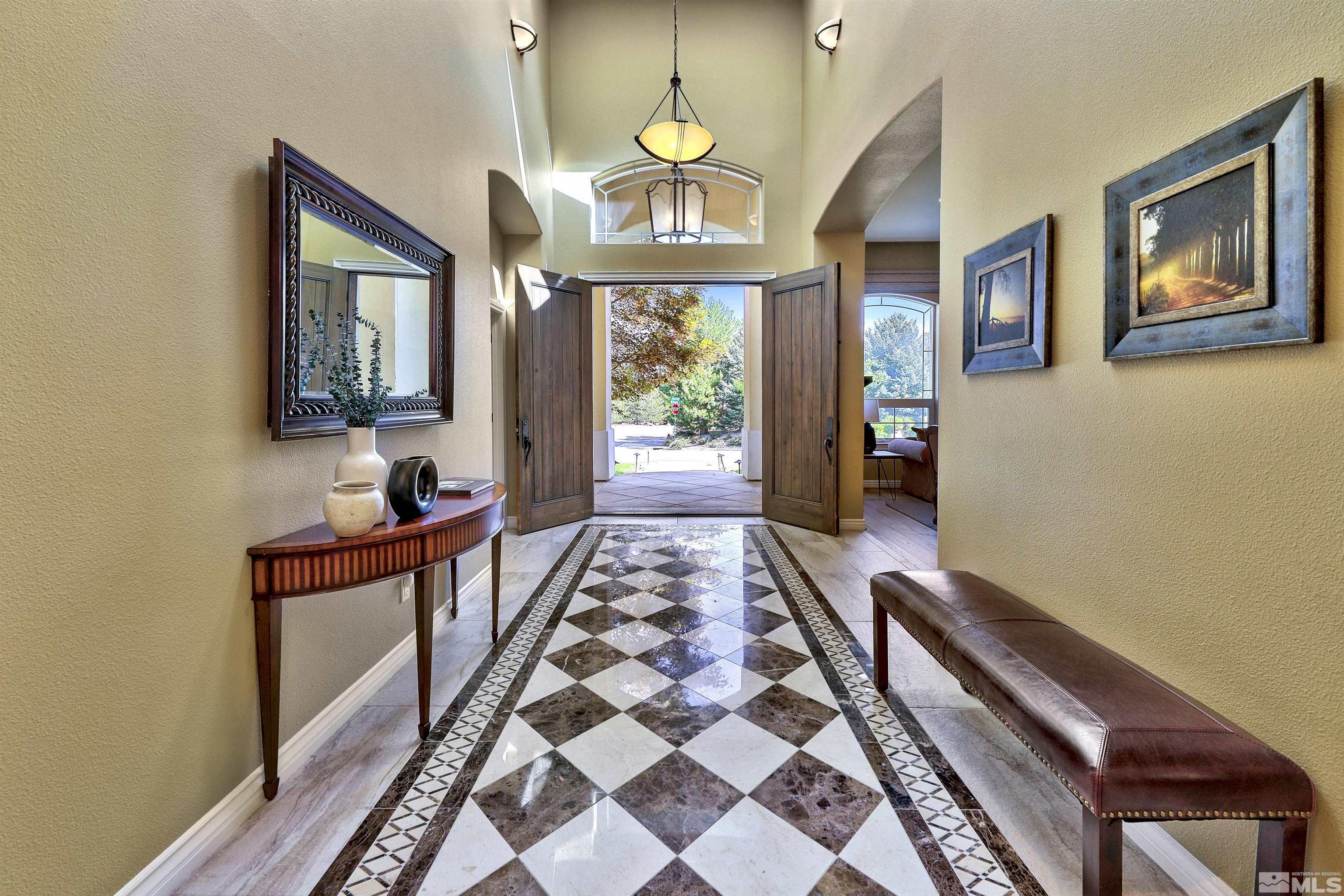 701 Aspen Trail Reno, NV 89519 - Photo 3 of 40 a view of a hallway with furniture