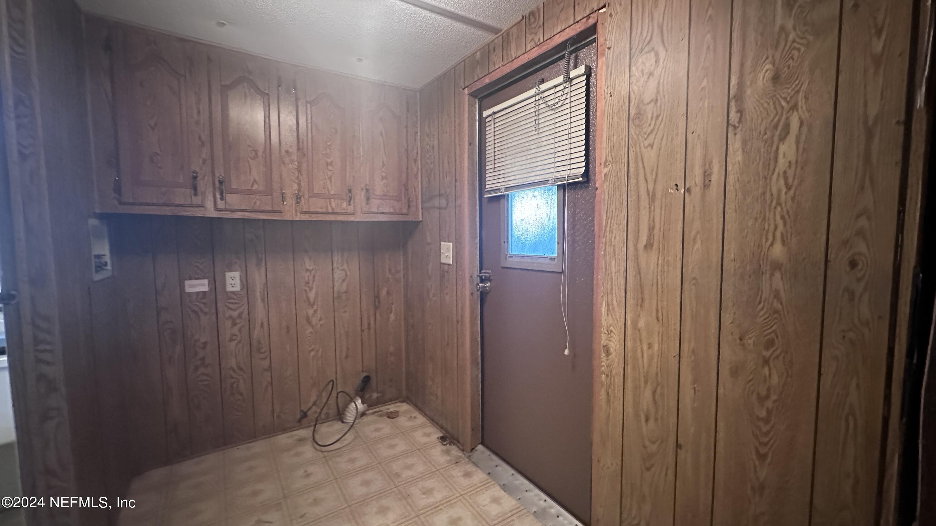 5002 Herton Road Jacksonville, FL 32258 - Photo 17 of 21 a view of an entryway with wooden floor