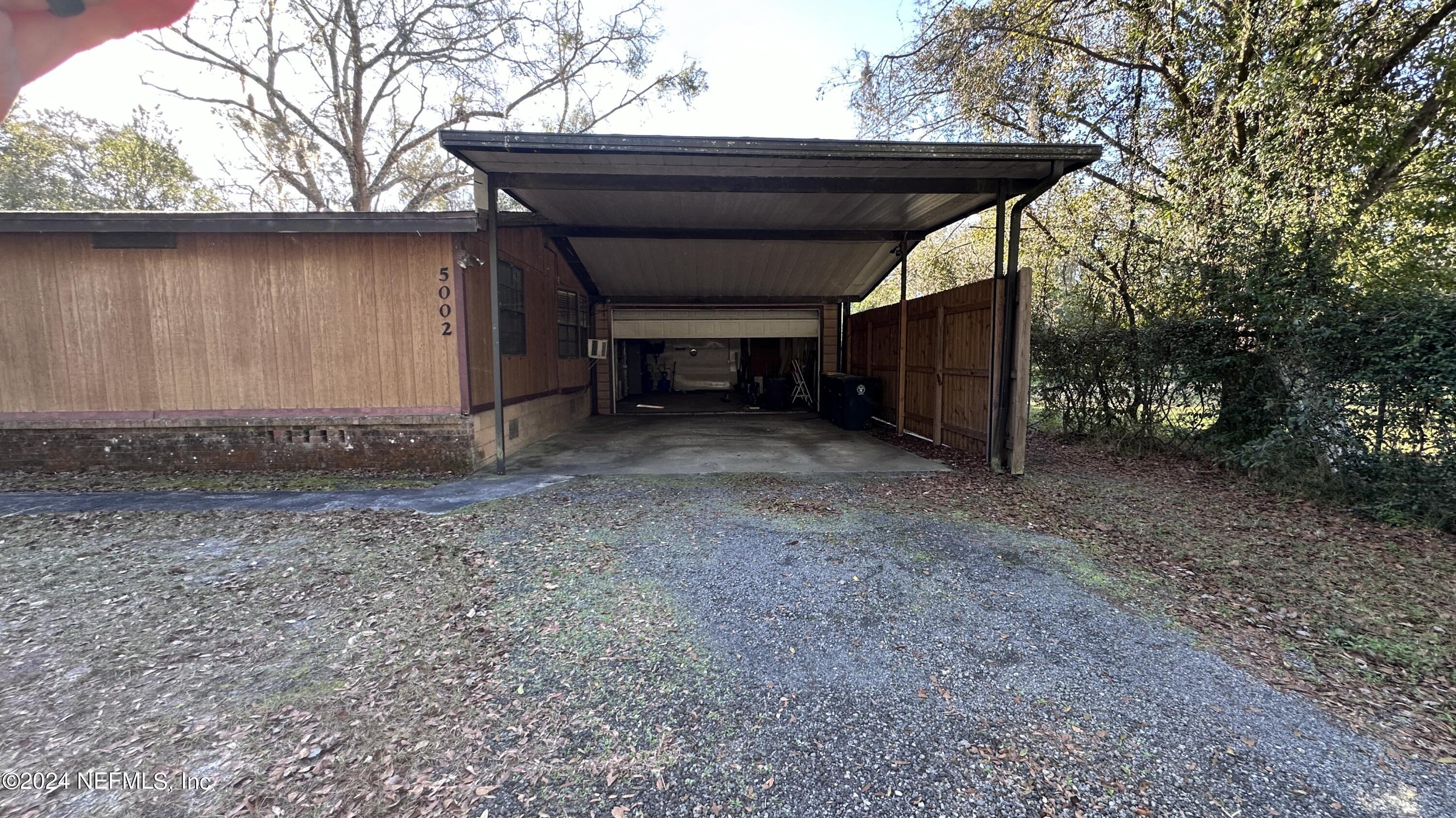 5002 Herton Road Jacksonville, FL 32258 - Photo 3 of 21 a view of a house with a outdoor space
