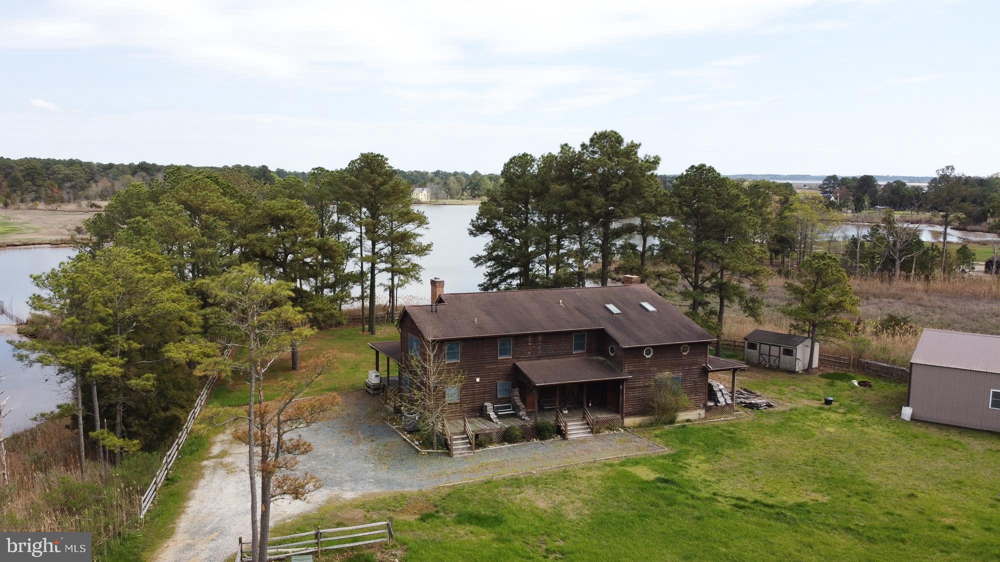 10191 Crab Island Road Princess Anne, MD 21853 - Photo 1 of 30 Custom built cedar home with wrap around decks