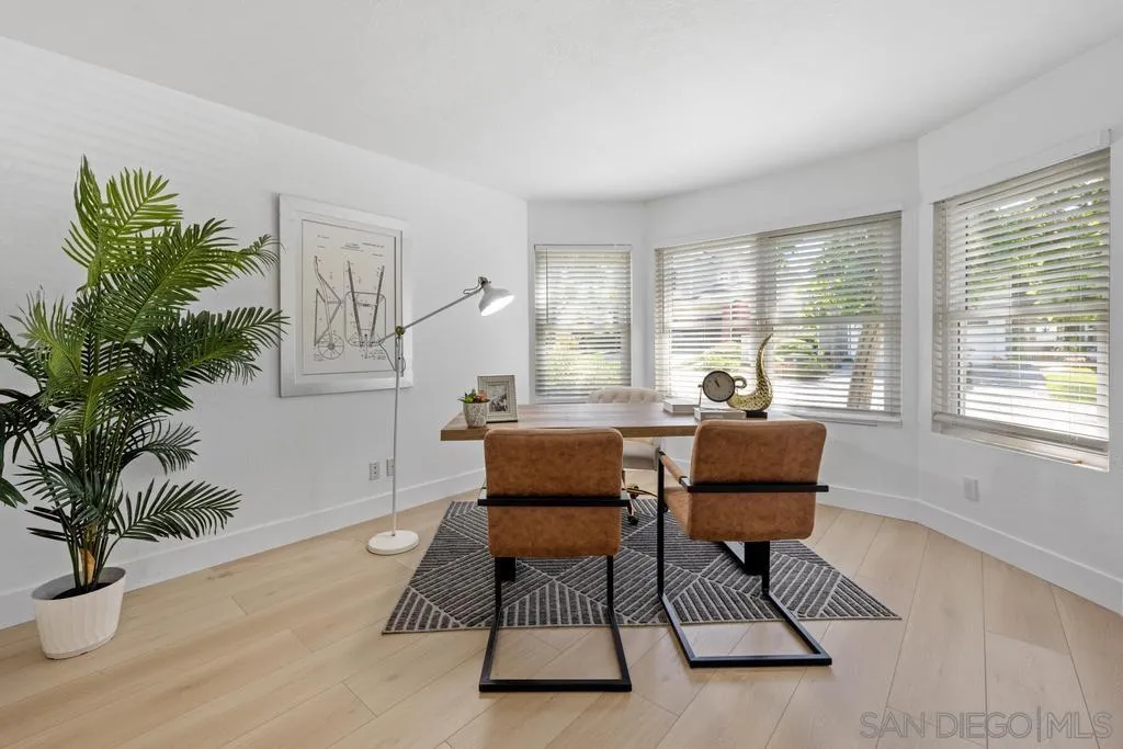 3638 Lorimer Lane Encinitas, CA 92024 - Photo 25 of 72 a living room with furniture and a potted plant