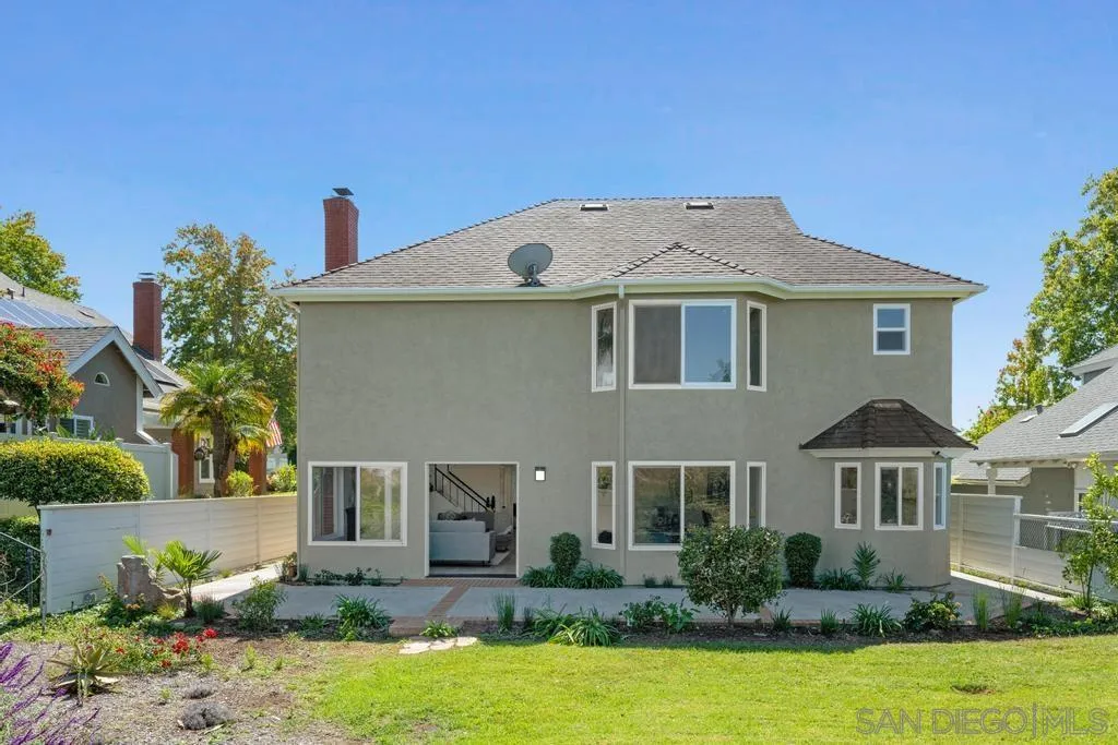 3638 Lorimer Lane Encinitas, CA 92024 - Photo 48 of 72 a front view of a house with a yard