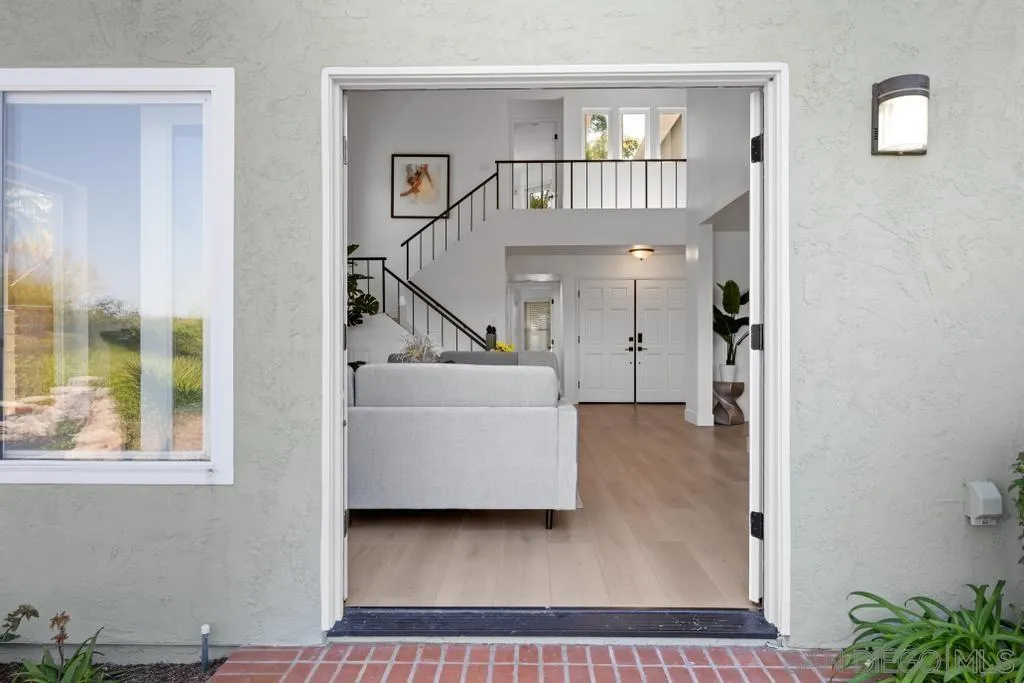 3638 Lorimer Lane Encinitas, CA 92024 - Photo 52 of 72 a view of a livingroom with furniture and windows