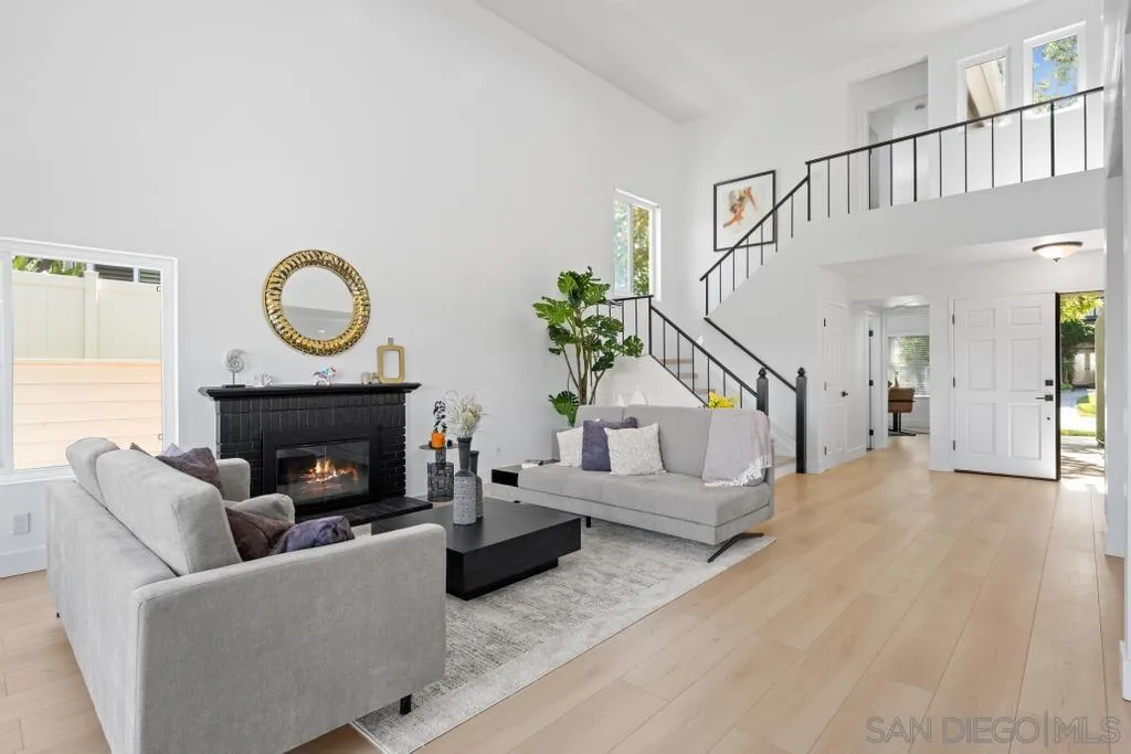 3638 Lorimer Lane Encinitas, CA 92024 - Photo 9 of 72 a living room with furniture and a fireplace