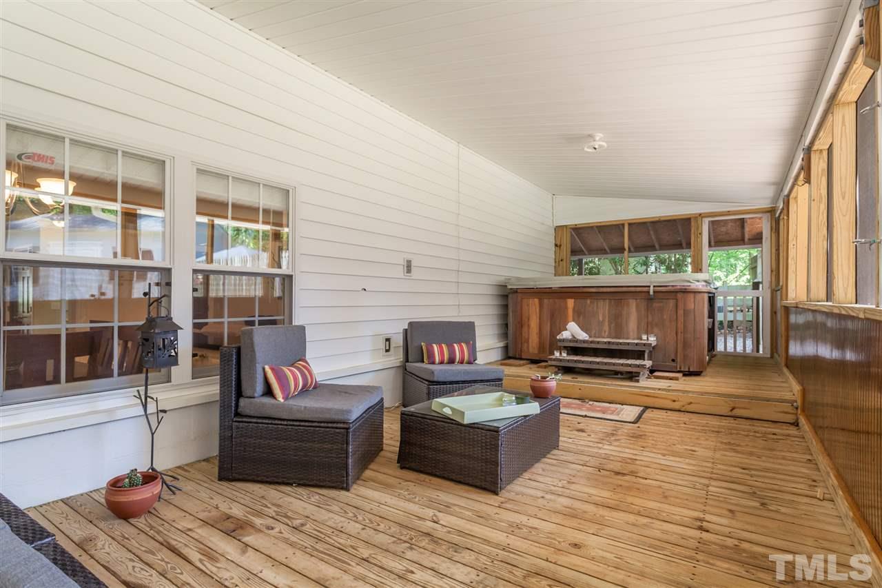 6609 King Lawrence Road Raleigh, NC 27607 - Photo 20 of 25 a living room with furniture and a fireplace
